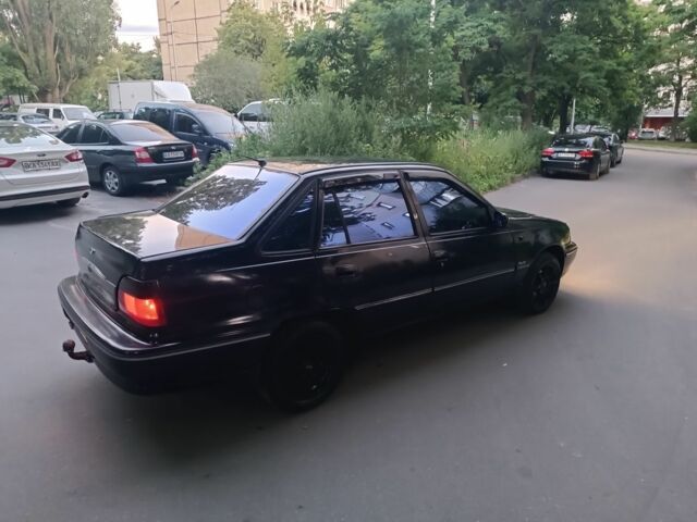 Синий Дэу Нексия, объемом двигателя 1.5 л и пробегом 389 тыс. км за 1600 $, фото 5 на Automoto.ua