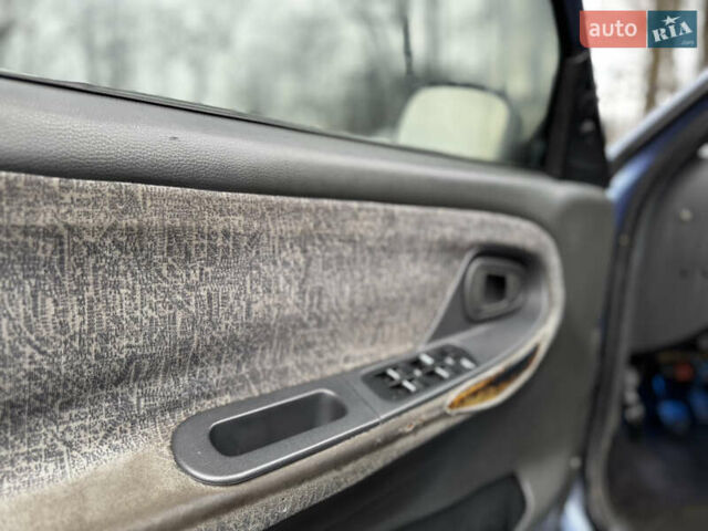 Синій Деу Нексія, об'ємом двигуна 1.5 л та пробігом 200 тис. км за 1050 $, фото 14 на Automoto.ua