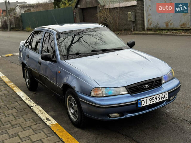 Синій Деу Нексія, об'ємом двигуна 1.5 л та пробігом 200 тис. км за 1050 $, фото 3 на Automoto.ua