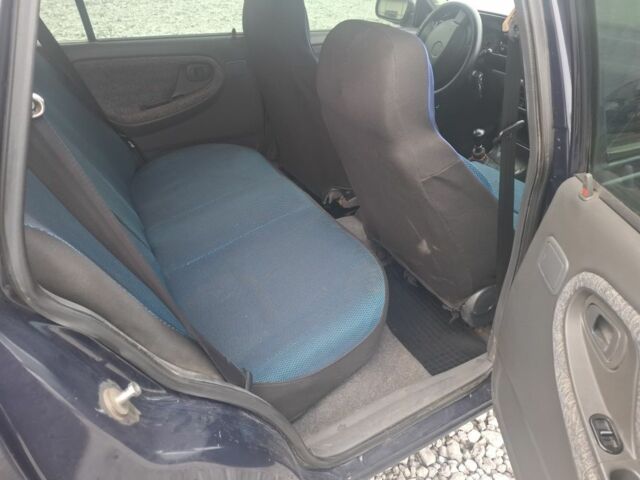 Синій Деу Нексія, об'ємом двигуна 1.5 л та пробігом 201 тис. км за 2550 $, фото 5 на Automoto.ua