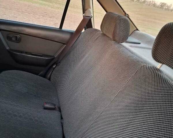 Синий Дэу Нексия, объемом двигателя 1.5 л и пробегом 117 тыс. км за 2500 $, фото 4 на Automoto.ua