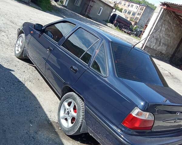 Синій Деу Нексія, об'ємом двигуна 1.5 л та пробігом 158 тис. км за 2300 $, фото 3 на Automoto.ua
