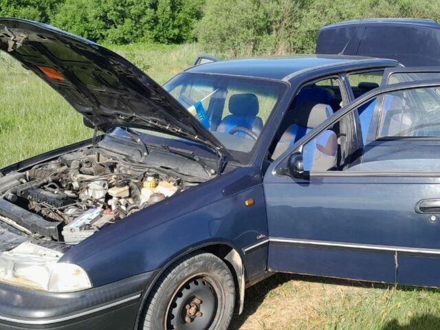 Синій Деу Нексія, об'ємом двигуна 1.5 л та пробігом 293 тис. км за 1500 $, фото 1 на Automoto.ua