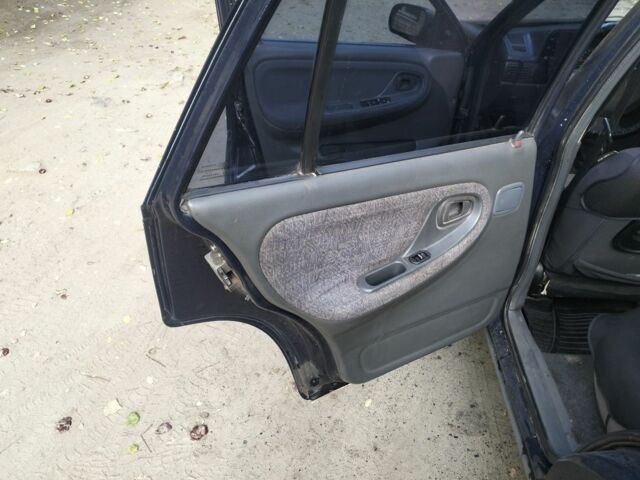 Синий Дэу Нексия, объемом двигателя 1.5 л и пробегом 250 тыс. км за 1301 $, фото 8 на Automoto.ua