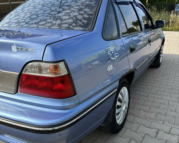 Синій Деу Нексія, об'ємом двигуна 1.5 л та пробігом 165 тис. км за 1700 $, фото 7 на Automoto.ua