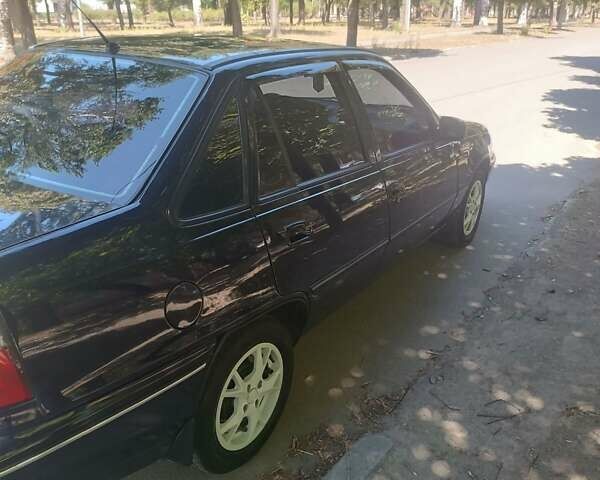 Синий Дэу Нексия, объемом двигателя 1.6 л и пробегом 164 тыс. км за 2900 $, фото 8 на Automoto.ua