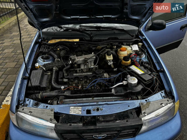 Синій Деу Нексія, об'ємом двигуна 1.5 л та пробігом 200 тис. км за 1050 $, фото 15 на Automoto.ua