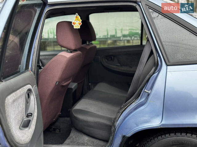 Синій Деу Нексія, об'ємом двигуна 1.5 л та пробігом 200 тис. км за 1050 $, фото 11 на Automoto.ua