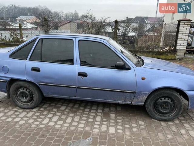 Синий Дэу Нексия, объемом двигателя 1.5 л и пробегом 270 тыс. км за 1800 $, фото 2 на Automoto.ua