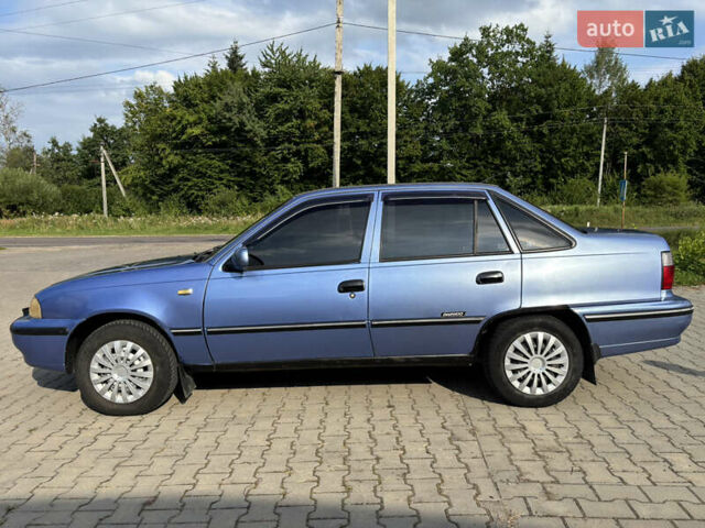 Синій Деу Нексія, об'ємом двигуна 1.5 л та пробігом 165 тис. км за 1700 $, фото 11 на Automoto.ua