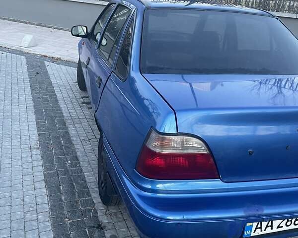 Синій Деу Нексія, об'ємом двигуна 1.5 л та пробігом 244 тис. км за 1700 $, фото 7 на Automoto.ua