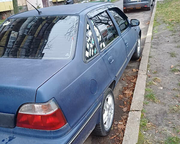 Синий Дэу Нексия, объемом двигателя 1.5 л и пробегом 350 тыс. км за 1540 $, фото 3 на Automoto.ua