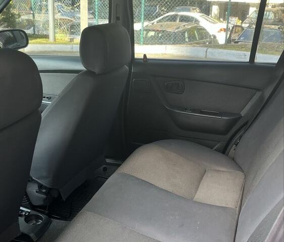 Синій Деу Нексія, об'ємом двигуна 1.5 л та пробігом 143 тис. км за 1350 $, фото 4 на Automoto.ua