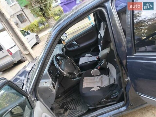 Синій Деу Нексія, об'ємом двигуна 1.5 л та пробігом 250 тис. км за 1301 $, фото 4 на Automoto.ua