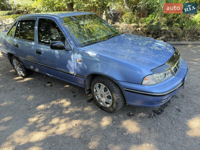 Синій Деу Нексія, об'ємом двигуна 1.5 л та пробігом 285 тис. км за 2000 $, фото 1 на Automoto.ua