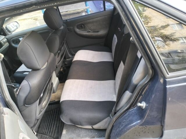 Синий Дэу Нексия, объемом двигателя 1.5 л и пробегом 250 тыс. км за 1301 $, фото 6 на Automoto.ua