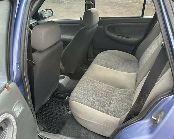 Синій Деу Нексія, об'ємом двигуна 1.5 л та пробігом 295 тис. км за 1000 $, фото 3 на Automoto.ua