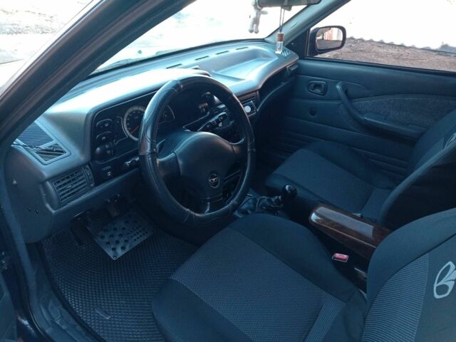 Синий Дэу Нексия, объемом двигателя 1.5 л и пробегом 150 тыс. км за 2400 $, фото 3 на Automoto.ua