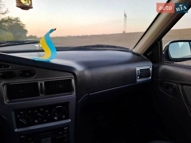 Синий Дэу Нексия, объемом двигателя 1.5 л и пробегом 117 тыс. км за 2500 $, фото 5 на Automoto.ua