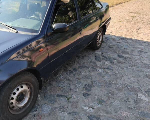 Синий Дэу Нексия, объемом двигателя 1.5 л и пробегом 205 тыс. км за 2100 $, фото 1 на Automoto.ua