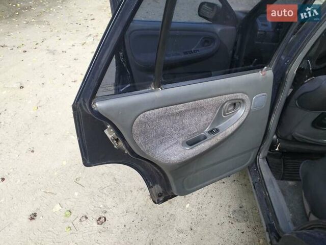 Синій Деу Нексія, об'ємом двигуна 1.5 л та пробігом 250 тис. км за 1301 $, фото 7 на Automoto.ua