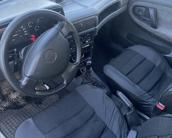 Синій Деу Нексія, об'ємом двигуна 1.5 л та пробігом 244 тис. км за 1700 $, фото 9 на Automoto.ua