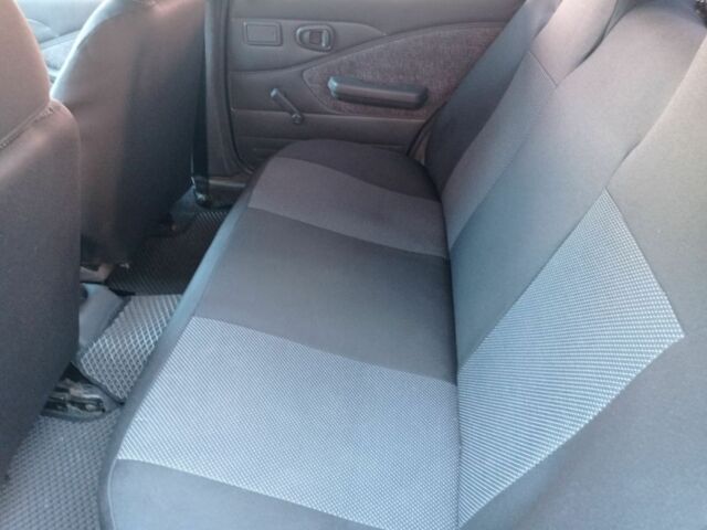 Синий Дэу Нексия, объемом двигателя 1.5 л и пробегом 150 тыс. км за 2400 $, фото 4 на Automoto.ua