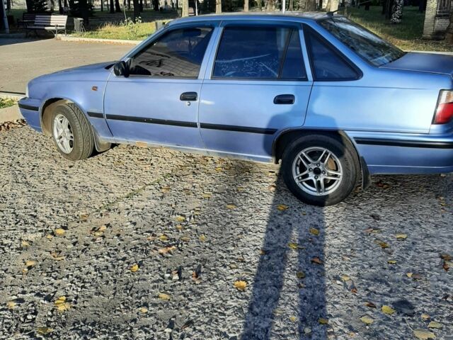 Синий Дэу Нексия, объемом двигателя 1.6 л и пробегом 230 тыс. км за 1100 $, фото 7 на Automoto.ua