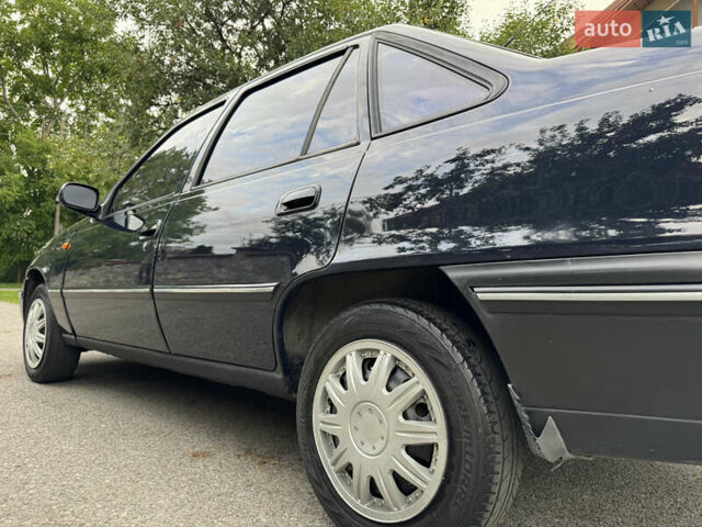 Синий Дэу Нексия, объемом двигателя 1.6 л и пробегом 180 тыс. км за 1549 $, фото 15 на Automoto.ua