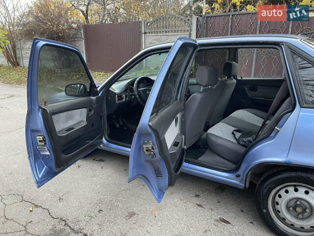 Синій Деу Нексія, об'ємом двигуна 1.5 л та пробігом 230 тис. км за 1900 $, фото 9 на Automoto.ua