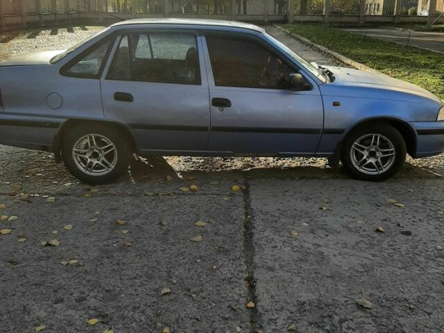 Синий Дэу Нексия, объемом двигателя 1.6 л и пробегом 230 тыс. км за 1100 $, фото 5 на Automoto.ua