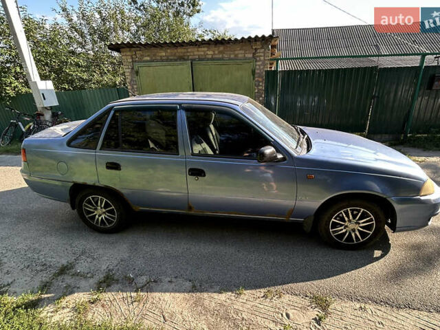 Синій Деу Нексія, об'ємом двигуна 1.5 л та пробігом 196 тис. км за 900 $, фото 2 на Automoto.ua