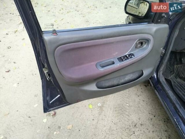 Синій Деу Нексія, об'ємом двигуна 1.5 л та пробігом 250 тис. км за 1301 $, фото 6 на Automoto.ua