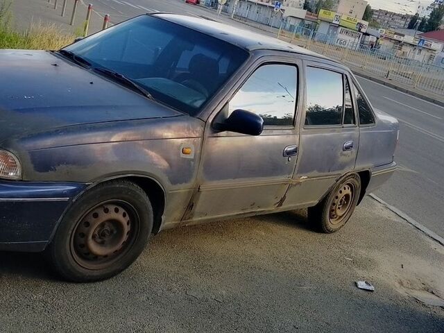 Синий Дэу Нексия, объемом двигателя 1.5 л и пробегом 279 тыс. км за 750 $, фото 4 на Automoto.ua