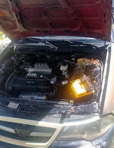 Синий Дэу Нексия, объемом двигателя 1.5 л и пробегом 255 тыс. км за 1100 $, фото 4 на Automoto.ua