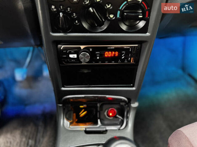 Синій Деу Нексія, об'ємом двигуна 1.5 л та пробігом 200 тис. км за 1050 $, фото 12 на Automoto.ua
