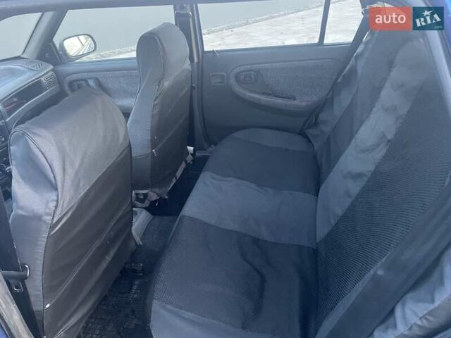 Синій Деу Нексія, об'ємом двигуна 1.5 л та пробігом 244 тис. км за 1700 $, фото 14 на Automoto.ua