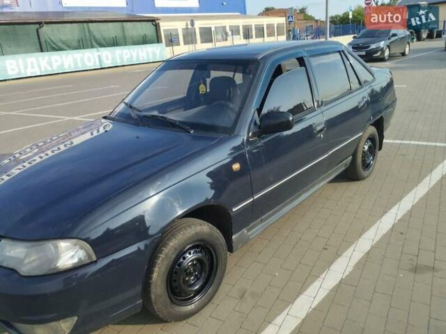 Синій Деу Нексія, об'ємом двигуна 1.5 л та пробігом 170 тис. км за 1399 $, фото 6 на Automoto.ua