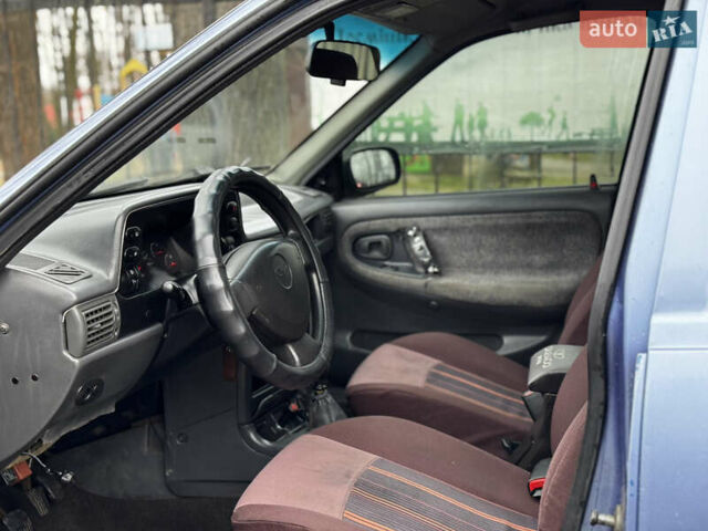 Синій Деу Нексія, об'ємом двигуна 1.5 л та пробігом 200 тис. км за 1050 $, фото 9 на Automoto.ua