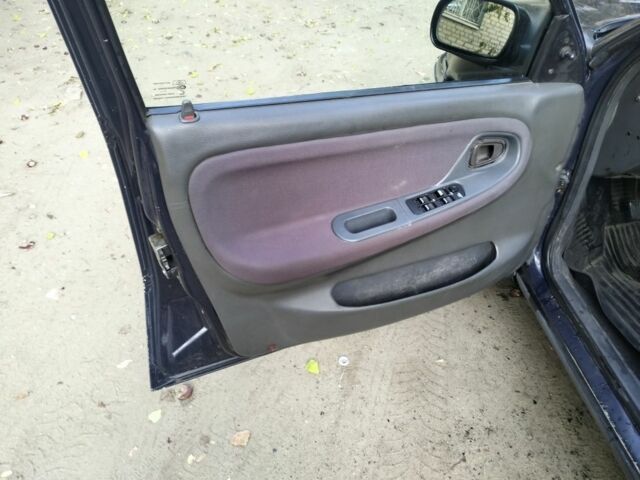 Синий Дэу Нексия, объемом двигателя 1.5 л и пробегом 250 тыс. км за 1301 $, фото 7 на Automoto.ua