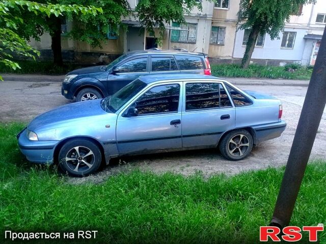 Синий Дэу Нексия, объемом двигателя 1.5 л и пробегом 250 тыс. км за 960 $, фото 1 на Automoto.ua