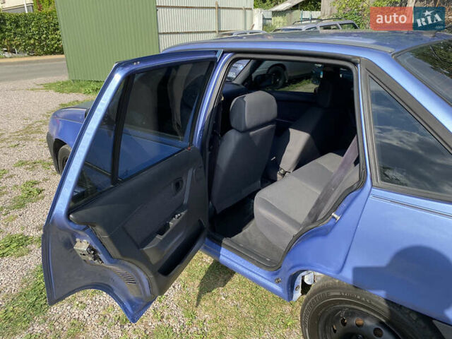 Синій Деу Нексія, об'ємом двигуна 1.5 л та пробігом 193 тис. км за 1800 $, фото 11 на Automoto.ua