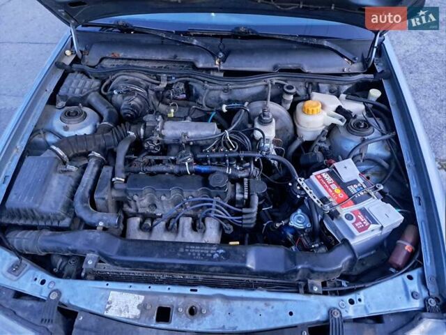 Синій Деу Нексія, об'ємом двигуна 1.5 л та пробігом 258 тис. км за 2700 $, фото 2 на Automoto.ua