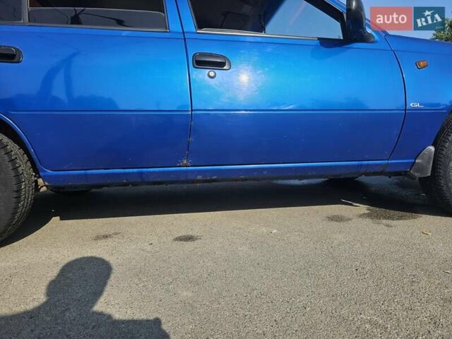 Деу Нексія 2011 у Могилев-Подольском на Automoto.ua Синій Деу Нексія, об'ємом двигуна 1.5 л та пробігом 109 тис. км за 2600 $, фото 5 на Automoto.ua