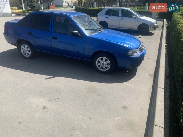 Синий Дэу Нексия, объемом двигателя 1.5 л и пробегом 202 тыс. км за 2100 $, фото 3 на Automoto.ua