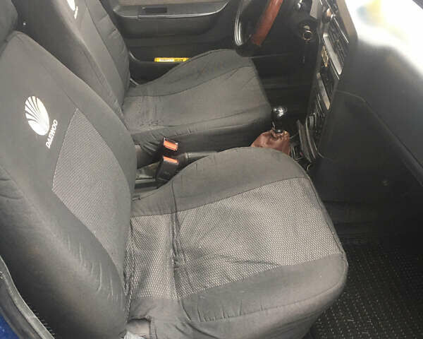 Синий Дэу Нексия, объемом двигателя 1.5 л и пробегом 275 тыс. км за 2400 $, фото 3 на Automoto.ua