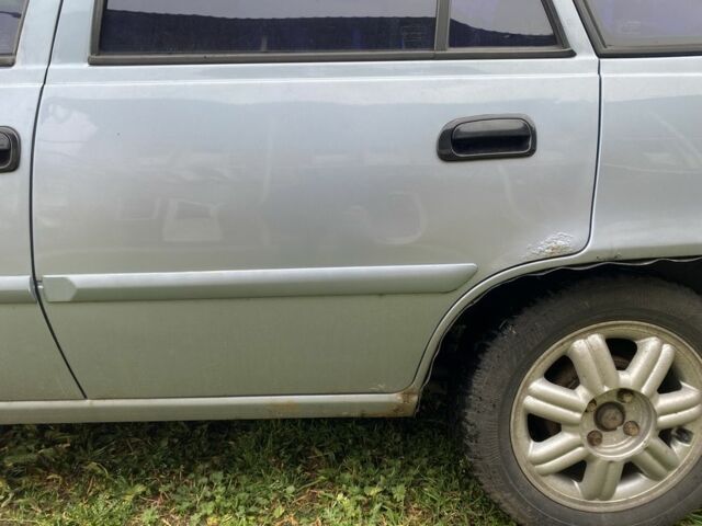 Синій Деу Нексія, об'ємом двигуна 1.6 л та пробігом 204 тис. км за 1350 $, фото 11 на Automoto.ua