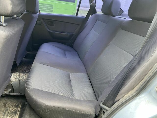 Синій Деу Нексія, об'ємом двигуна 1.6 л та пробігом 204 тис. км за 1350 $, фото 14 на Automoto.ua