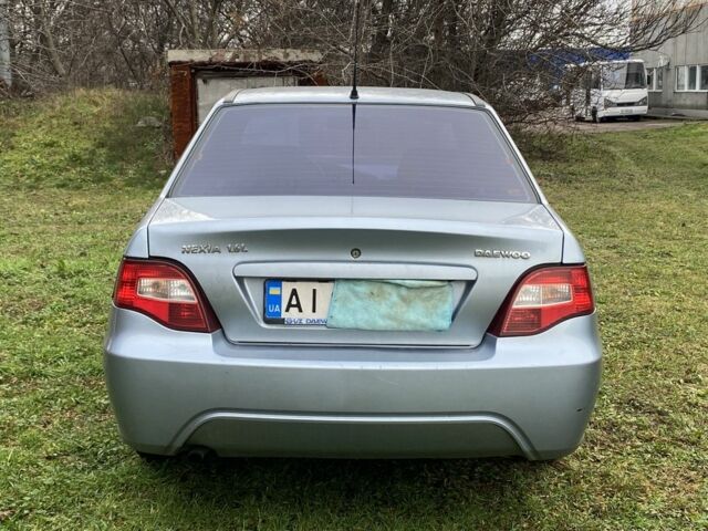 Синій Деу Нексія, об'ємом двигуна 1.6 л та пробігом 204 тис. км за 1350 $, фото 6 на Automoto.ua