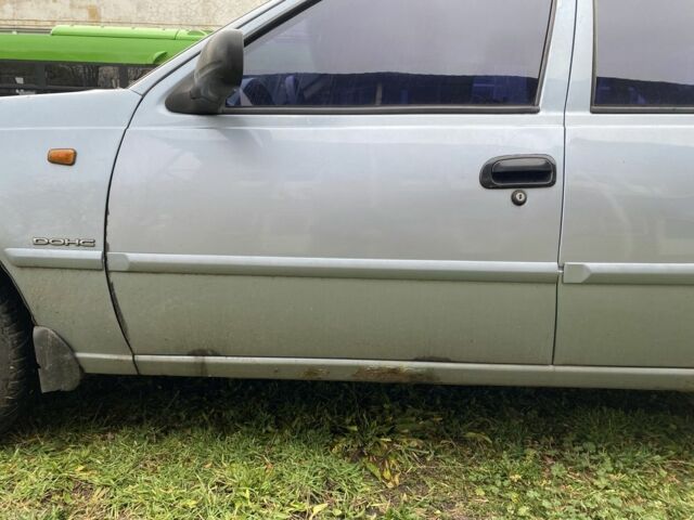 Синій Деу Нексія, об'ємом двигуна 1.6 л та пробігом 204 тис. км за 1350 $, фото 10 на Automoto.ua